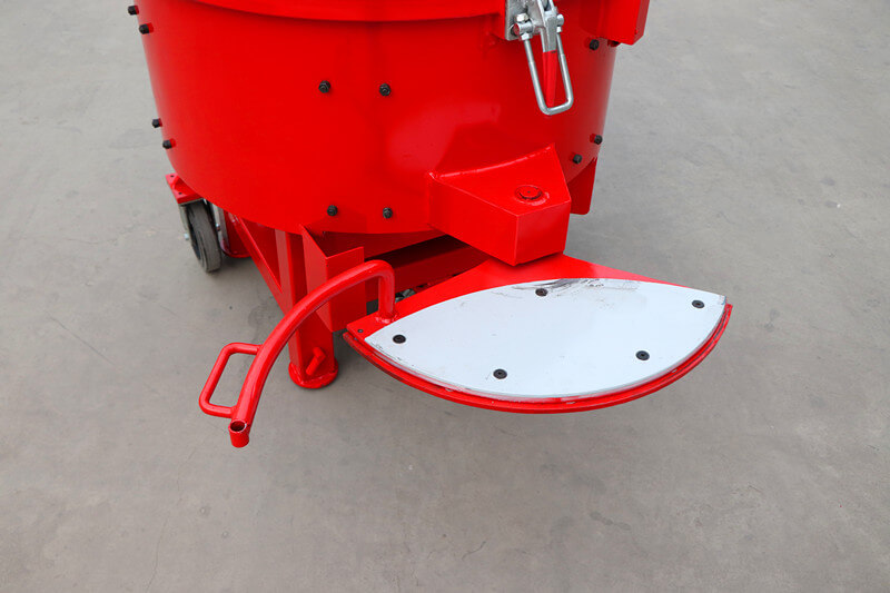 refractory pan mixer with hydraulic discharge door