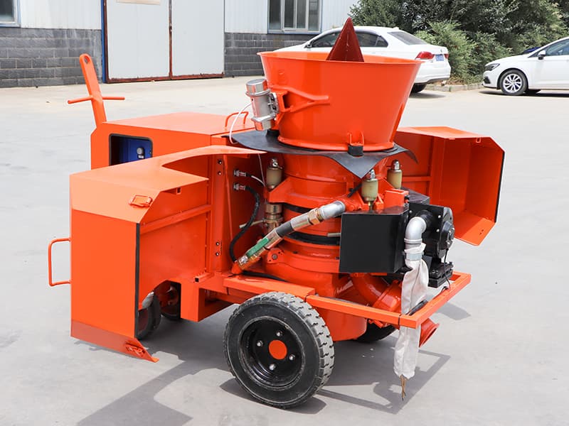 gunning machine for spraying refractory material