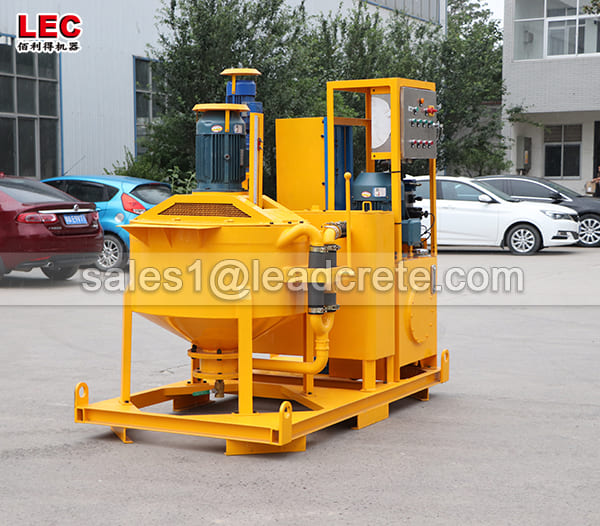 Compaction grouting pump with mixer